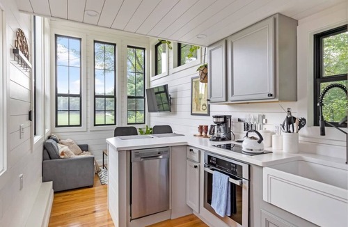 Johnson House | Haven Tiny House near Stowe with Hot Tub, Sauna, River & Mountain Views
