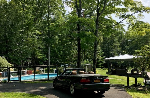 Woodstock House | Heart of Woodstock — Unique Arts-and-Crafts Home: Outdoor Room and Heated Pool!