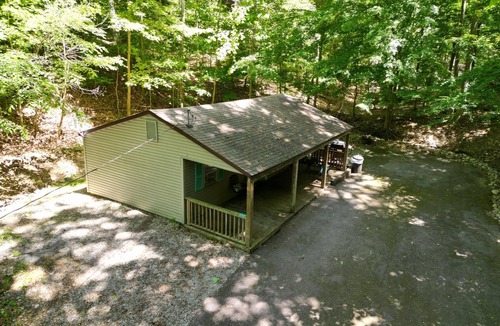 Eddyville Cottage | Heartland Holiday Bungalow - Secluded cabin: 1BR (2Q), 1BA (shower), LR, kitchen, patio, fire pit.