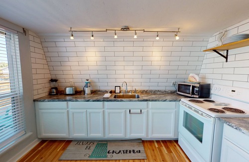 Leeward Sands House | Heated Private Pool, Pet Friendly, Golf Cart Access