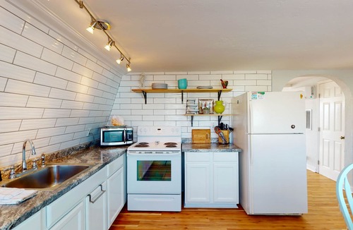 Leeward Sands House | Heated Private Pool, Pet Friendly, Golf Cart Access