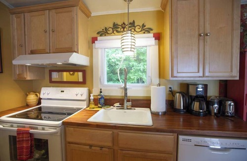 Town of Ledyard House | Heck-Of-A-Deck Lakehouse with Sunsets, and Kayaks, too!