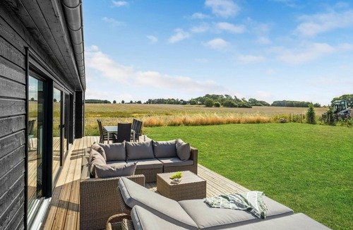 Havnsø House | Here you can expect a modern vacation home with stylish interior and comfortable outdoor area.