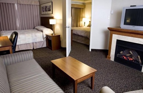 Brooks Hotel | Heritage Inn & Suites
