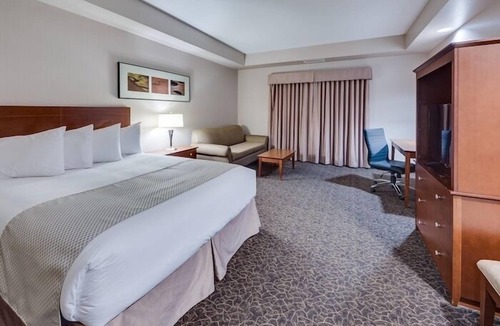 Brooks Hotel | Heritage Inn & Suites