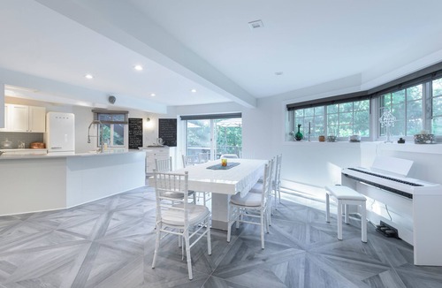 Hampton Bays House | Hexagon shape cottage with pool & koi fish pond