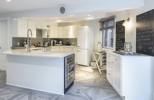 Hampton Bays House | Hexagon shape cottage with pool & koi fish pond