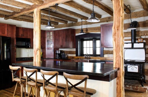 Treloar Cabin | Hidden Lake Log Cabin sleeps 18 - fire pit, double kitchens, outdoor seating