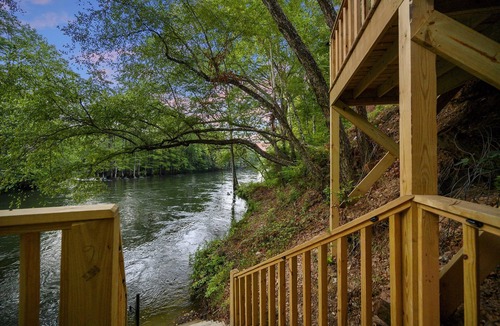 Broken Bow Cabin | Hideaway ~ riverfront with pool, game room, hot tub and kayaks that sleeps 10