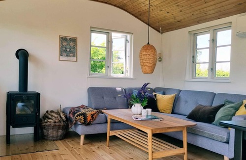 Hornslet House | High-lying home with a view of the sea and forest