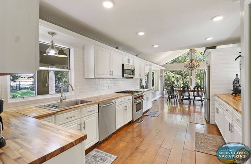 Twin Lakes House | Highland House on Lake Mary with Pool Dock Game Room Sleeps 21