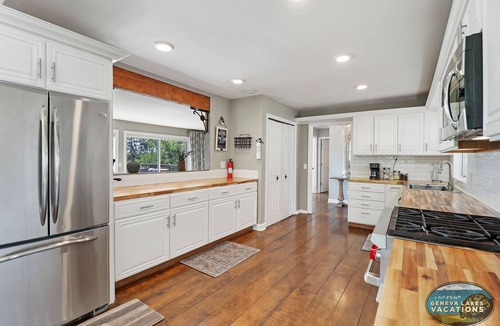 Twin Lakes House | Highland House on Lake Mary with Pool Dock Game Room Sleeps 21