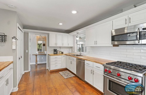 Twin Lakes House | Highland House on Lake Mary with Pool Dock Game Room Sleeps 21