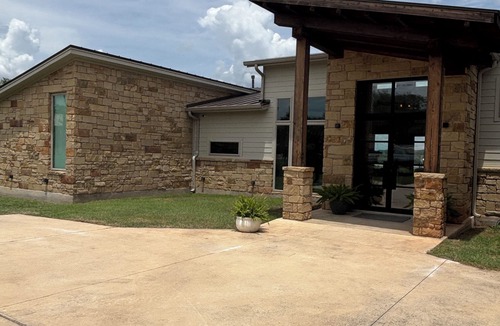 Lick Creek Ranch House | Hill Country modern farmhouse with beautiful views