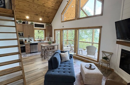Harrison Cabin | Hilltop Forest View with Large Windows, Covered Deck, & Private Hot Tub for Two!