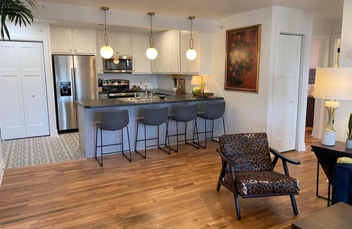 Woodward Apartment | Historic 100+ year old restored 6 unit fully furnished apartment building.