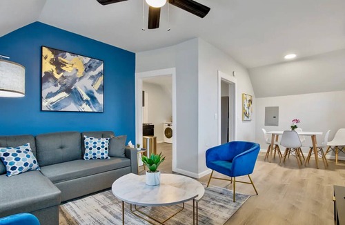 Everett Apartment | Historic 2 BR apartment in Everett w/modern comforts. Features AC, full kitchen, W/D, and dedicated workspace. Only 4 mins to Providence Medical & close to Naval Station. Free street parking