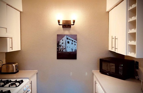 Barelas Apartment | Historic Bakery Storefront-Private Yard & Laundry
