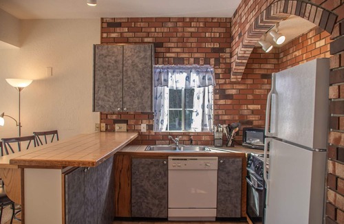 Historic Bayfront Condo | Historic Bay Front! Views of the Marina! Fully Stocked Kitchen! Walk to Everything!