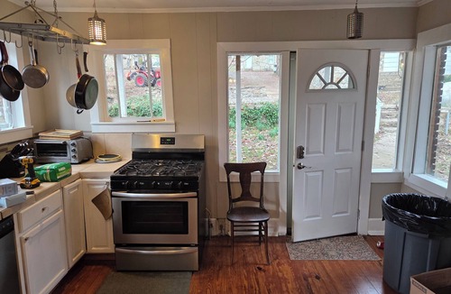 Hardy Cottage | Historic Carrie Tucker Cottage with view of Spring River in charming Hardy, Ark.