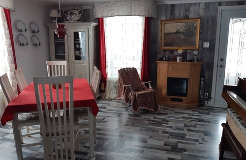 Maria-Chapdelaine House | Historic Centennial House: Large courtyard for campfire and activities.