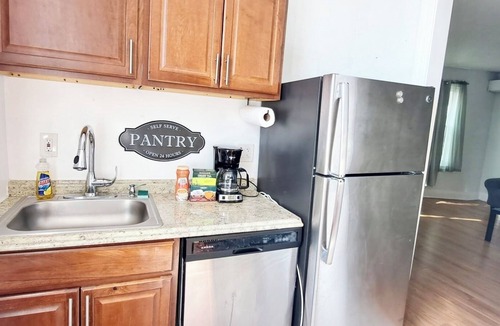 Old Goucher Apartment | Historic Charm W/Modern Patio Escape