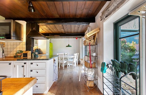 Eggstedt House | Historic 'Haus Reetglück' with Large Garden, Sauna, Antique Fireplace & Wi-Fi