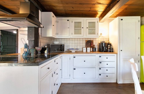 Eggstedt House | Historic 'Haus Reetglück' with Large Garden, Sauna, Antique Fireplace & Wi-Fi