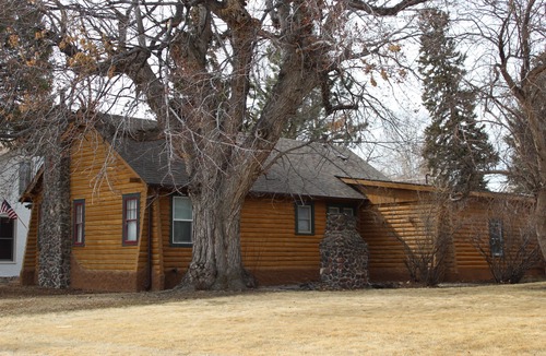 Buffalo House | Historic Log Cabin home on Main Street