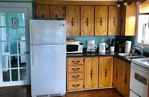 Fogo House | Historic Saltbox House overlooking the ocean.