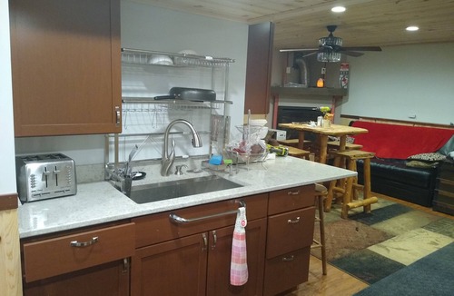 Pine Island House | Hobby Farm Country Getaway 2 Bedroom Basement Apartment in Large Farmhouse