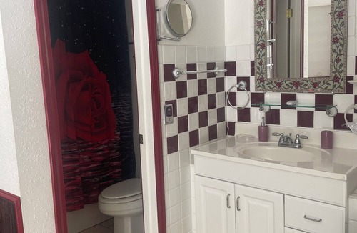 Eminence Cottage | Hogan's Hideout Duplex #20 Jacuzzi Room is a relaxing, cozy room