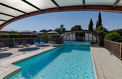 Castelnaud-la-Chapelle House | Holiday Home 'Fleurie' with Shared Pool, Wi-Fi & Air Conditioning