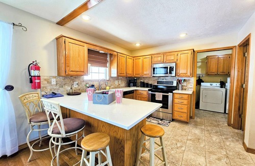 Holiday Island House | Holiday Haven On The Island! nSleeps 12! Fire pit! 6-Seater Golf Cart Included!