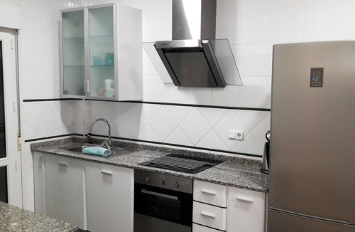 Dehesa de Campoamor House | Holiday Home & Beachside Townhouse & with Sea Views, Shared Pool & Wi-Fi