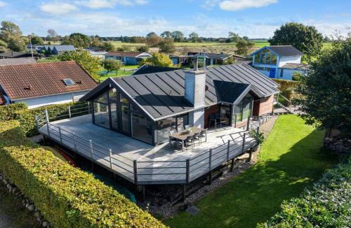 Tørresø House | Holiday Home Berner - 40m from the sea by Interhome