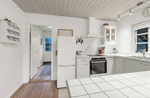 Bjerringbro House | Holiday home by Gudenå River with natural garden