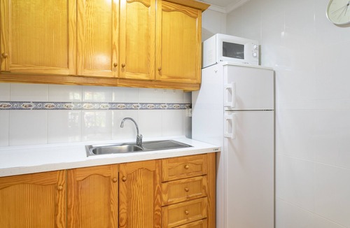 Gran Alacant House | Holiday Home 'Casa en la playa con piscinas 11 A' with Shared Pool, Wi-Fi and Air Conditioning