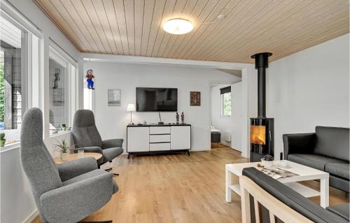 Øksenmølle House | Holiday Home Ebeltoft With A Fireplace 01