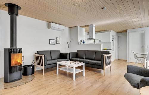 Øksenmølle House | Holiday Home Ebeltoft With A Fireplace 01