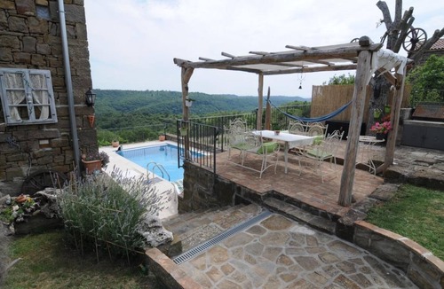 Bric House | Holiday home in a quiet location with pool and far-reaching views