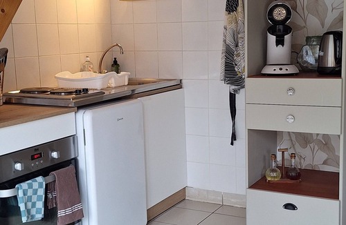 Fye House | Holiday Home 'La Maisonnette Du Meslay' with Private Terrace, Shared Garden & Wi-Fi