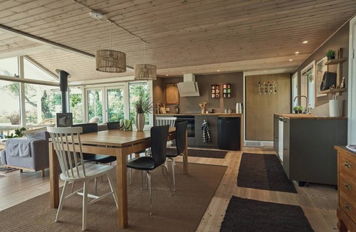 Lyngsbæk Strand House | Holiday home on natural grounds with sea views