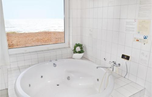 Lild Strand House | Holiday Home Sandnæshagevej Frøstrup Iv