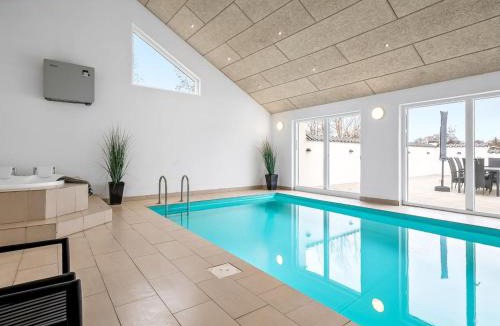 Grena Strand House | Holiday Home Synne - 350m from the sea by Interhome