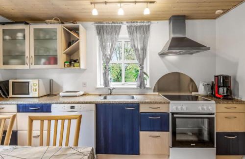 Skygge House | Holiday Home Tomassine by Interhome