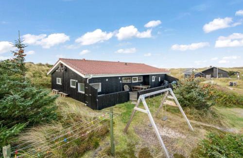 Houvig Strand House | Holiday Home Wighman - from the sea by Interhome