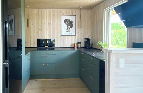 Lundø House | Holiday home with pool and fjord views on Lundø