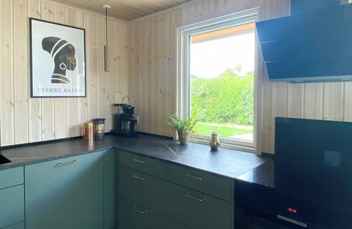 Lundø House | Holiday home with pool and fjord views on Lundø
