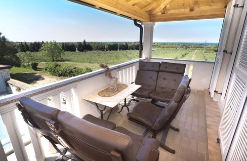 Savudrija House | Holiday house with a heated pool and a sea view
